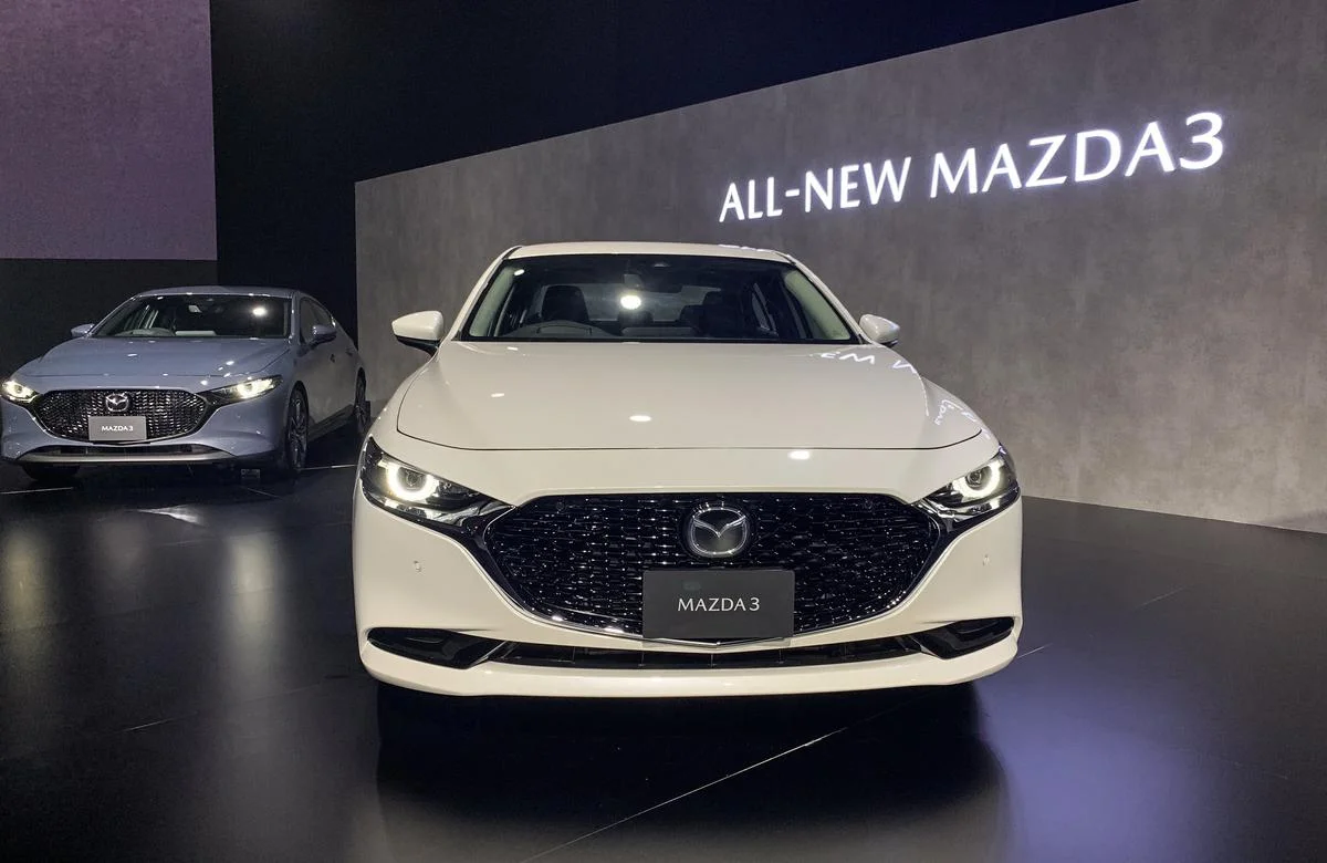 Hình ảnh minh họa bình xăng xe Mazda 3 và hiệu quả tiêu thụ nhiên liệu thực tế.